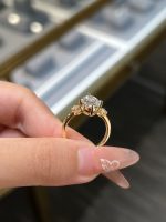 Oval Cut Lab Grown Diamond Three-Stone Engagement Ring in 18K Yellow Gold