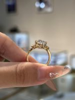 Oval Cut Lab Grown Diamond Three-Stone Engagement Ring in 18K Yellow Gold