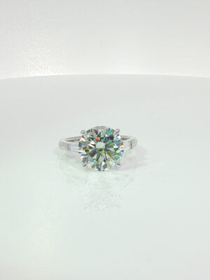 5 Carat Round Three-Stone Lab Grown Diamond Engagement Ring in 18K Gold